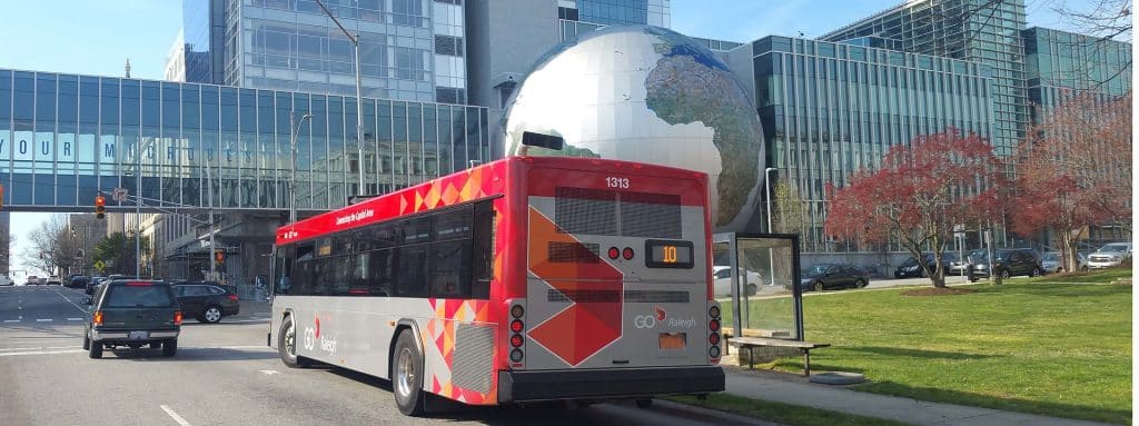 GoRaleigh Bus carrying passengers, Raleigh transport advertising agency