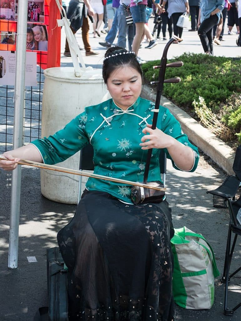 An erhu player, performs  at Cleveland Asian Festival.