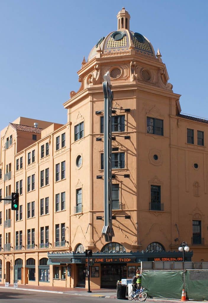 People visiting Balboa Theatre building, San Diego advertising agency