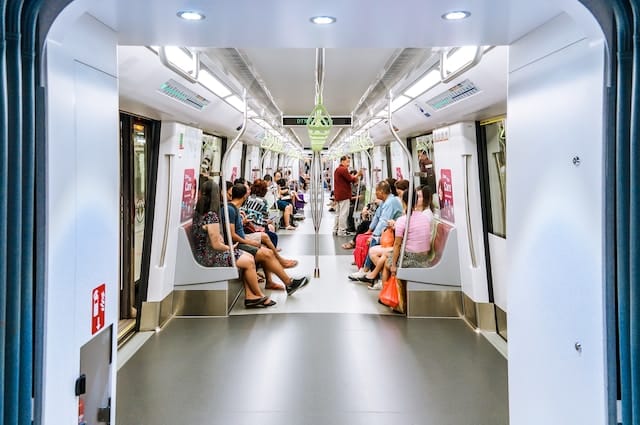 Commuters on the Singapore MRT, Singapore advertising agency