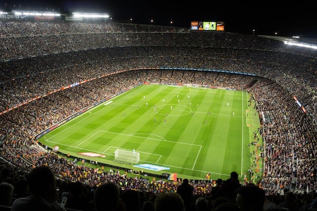 Camp Nou packed with fans while watching game, Barcelona sports advertising agency