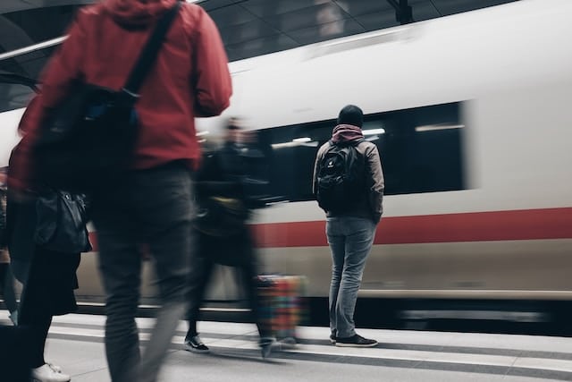 Train passing through berlin central station, berlin transport advertising agency