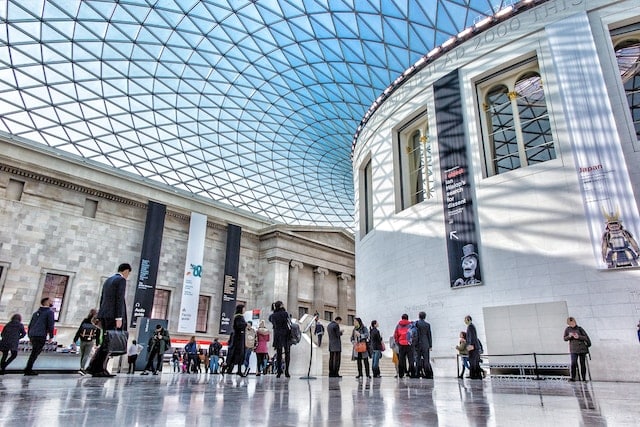 People visiting the historical British Museum, London advertising agency.