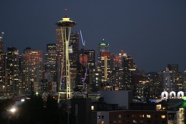 Night view of Space Needle, Seattle advertising agency