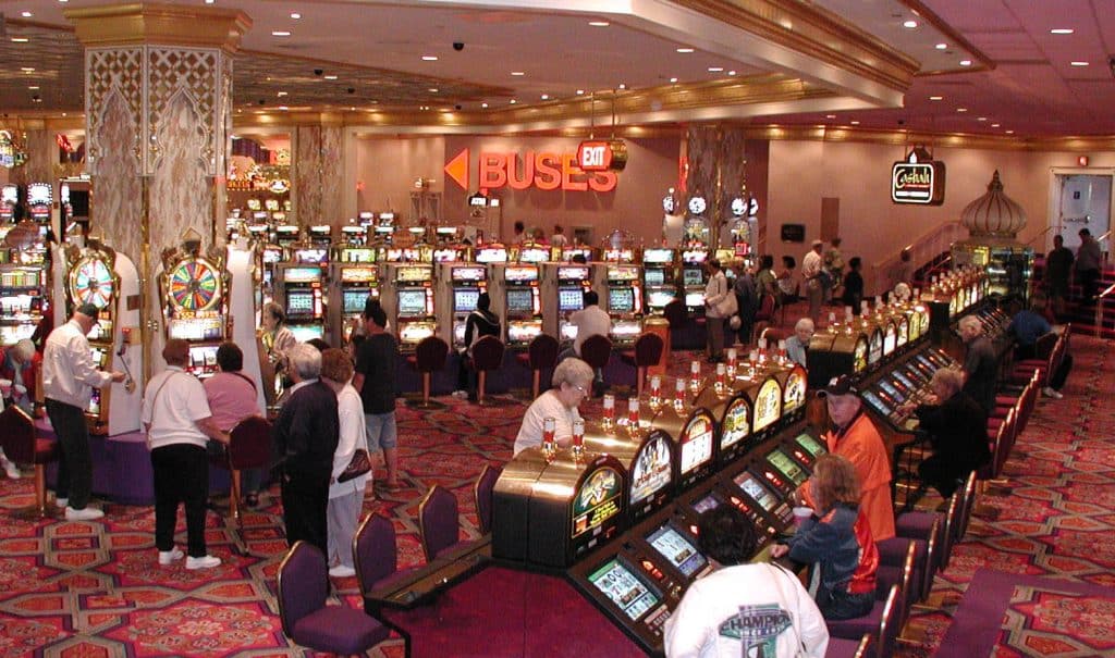 People at slot machines at former Trump Taj Mahal, Gambling Advertising Agency.