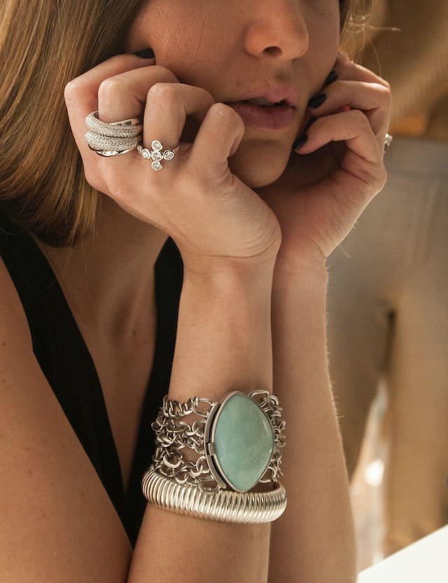 A woman wearing rings and bracelet, Accessories & Jewelry Advertising Agency.