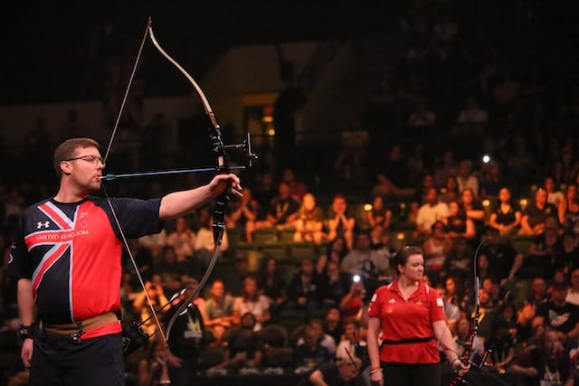 Archer taking a aim during match, Sports Advertising Agency.