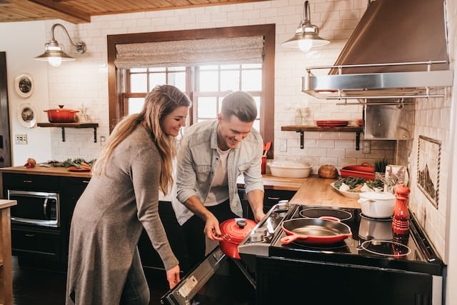 A couple working in a kitchen, Home Goods & Cooking Advertising Agency.