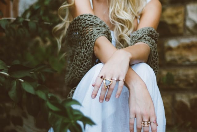 Women wearing variety of rings, Accessories & Jewelry Advertising Agency.