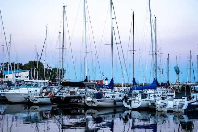 Boats at harbor, Yacht & Boat Advertising Agency.