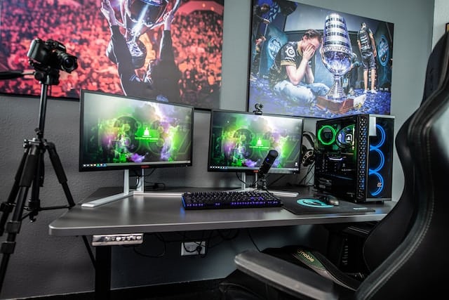 A proper video gaming setup with chair, monitors and GPU, Video Game Advertising Agency.
