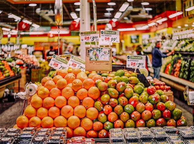 Fruits and vegetables at display at a store, Grocery Advertising Agency.