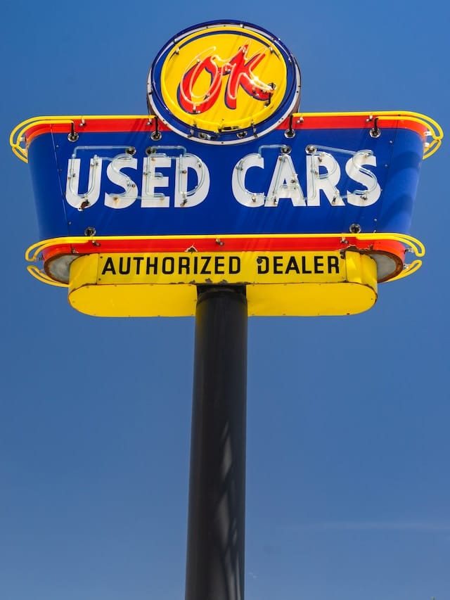 A billboard advertising for used car dealer agnecy, Car Dealer Advertising Agency.