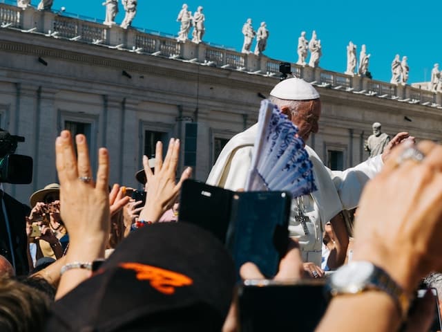 Pope giving blessings to followers, Church Advertising Agency.