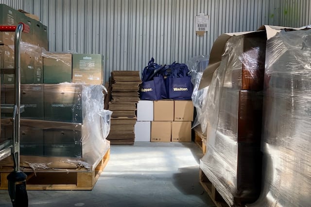 A warehouse with delivery products, Delivery Advertising Agency.