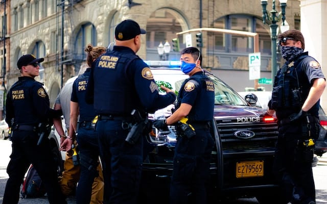 A group of law enforcement personnel on duty, Law Enforcement Advertising.